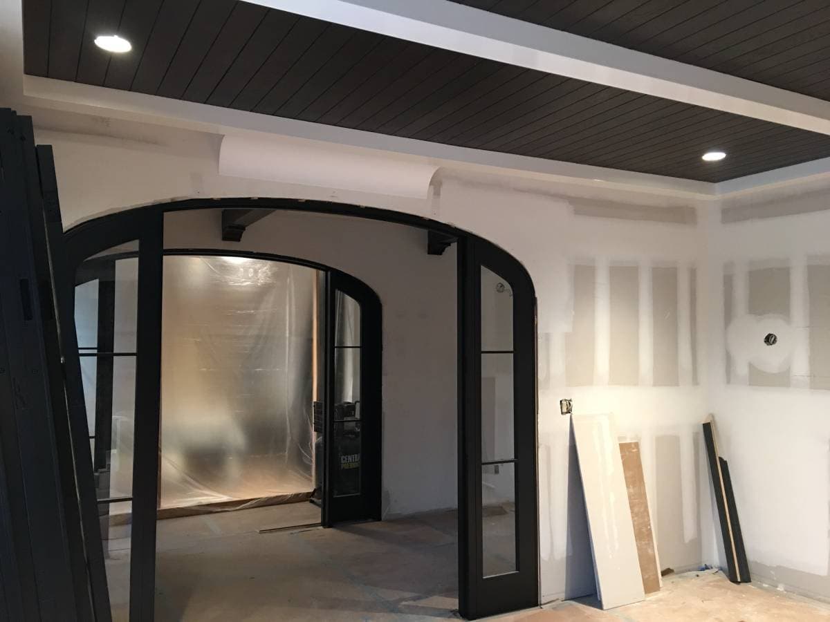 picture of a home in island park long island new york with new drywall getting ready to be painted